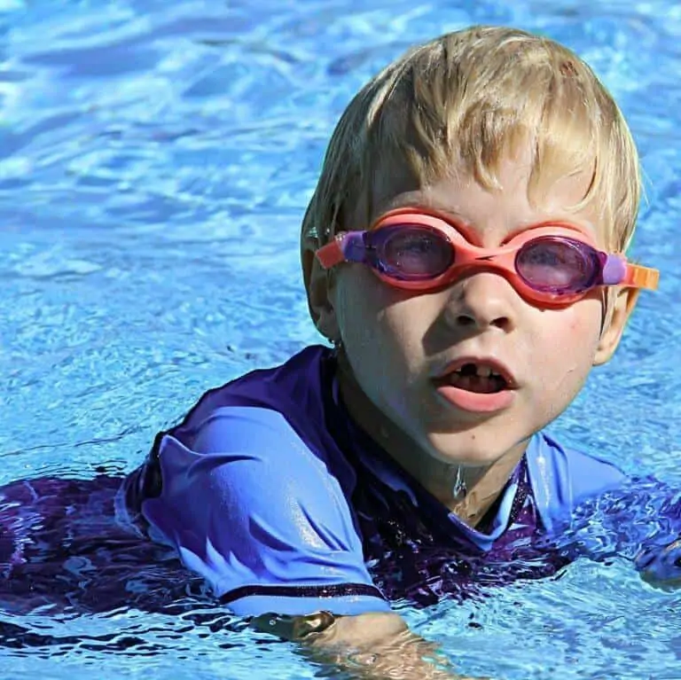 boy in pool during swim lesson in knoxville tn