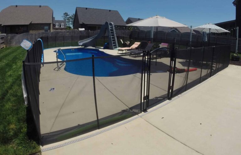 backyard pool with safety fence to demonstrate pool safety