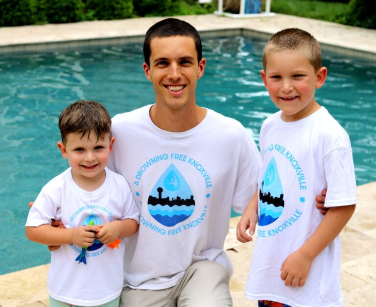 swim instructor with two students in Knoxville TN