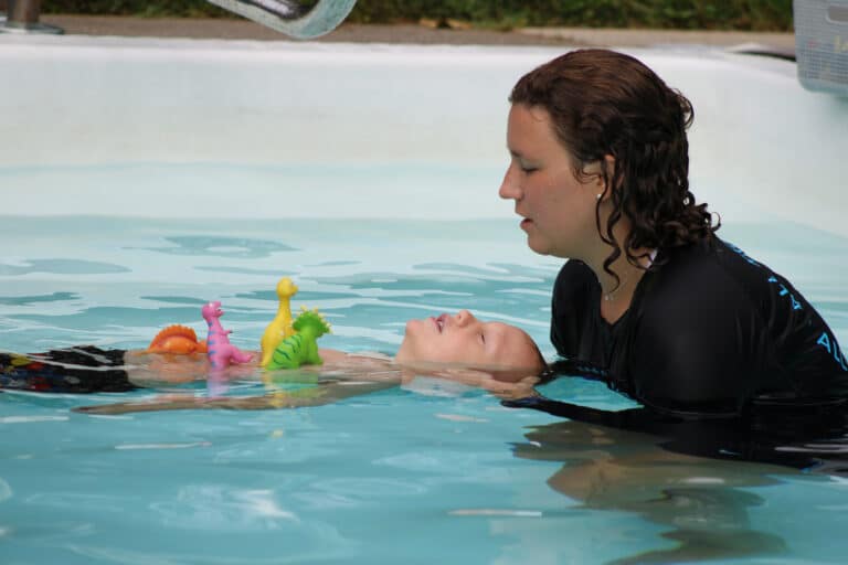 ISR swim lessons a child does back float